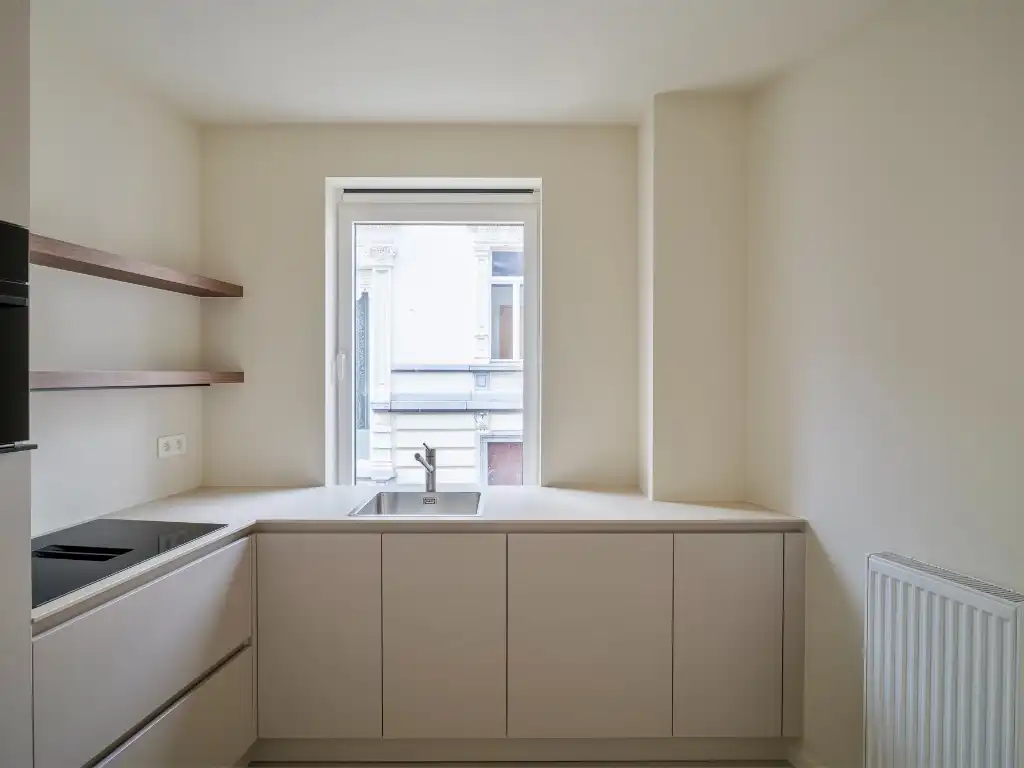 Hoogwaardig gerenoveerd duplex appartement met zonnig terras in het centrum van Gent foto 4
