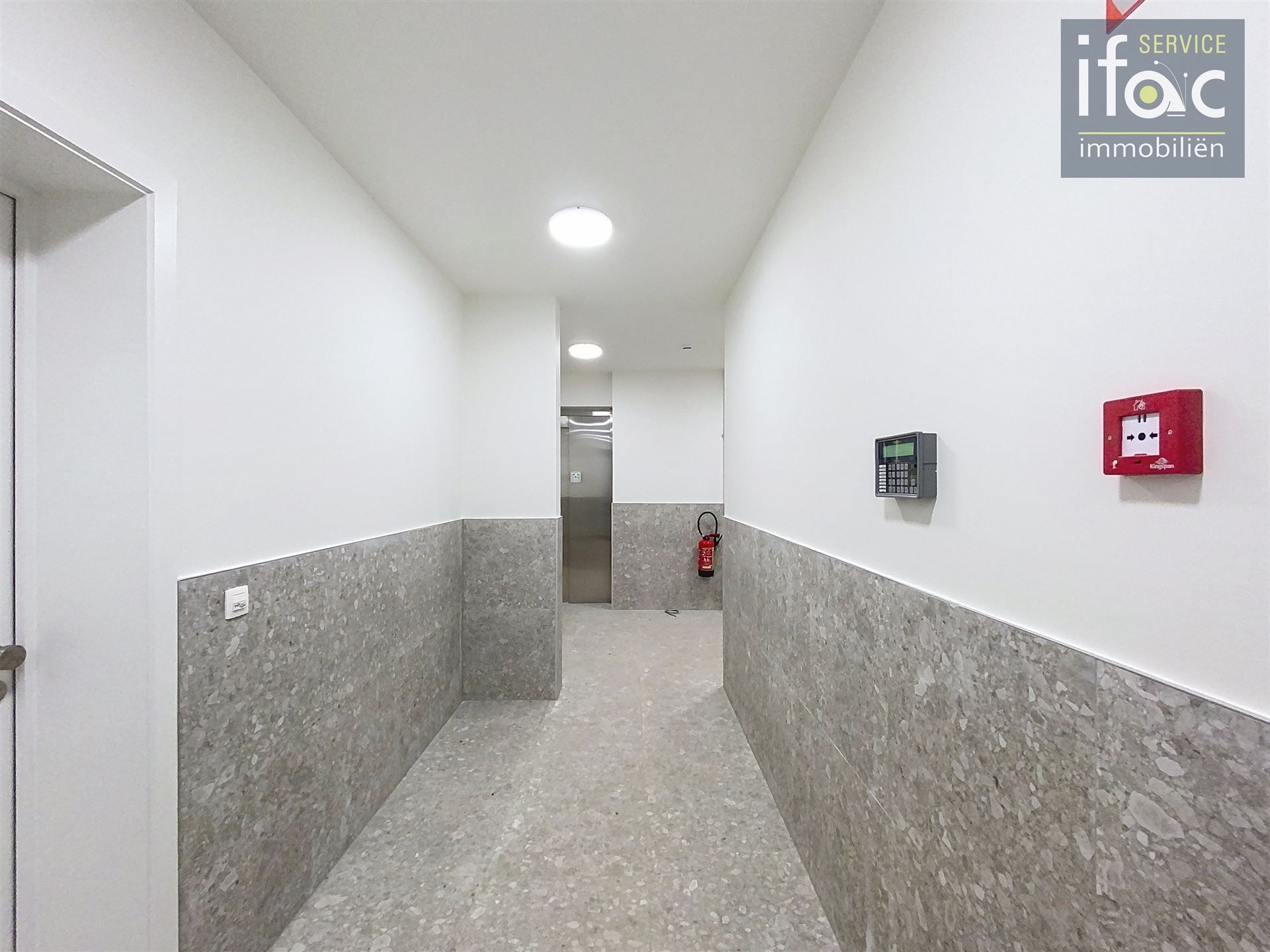 Nieuwbouw appartement met terras en ondergrondse staanplaats foto 18