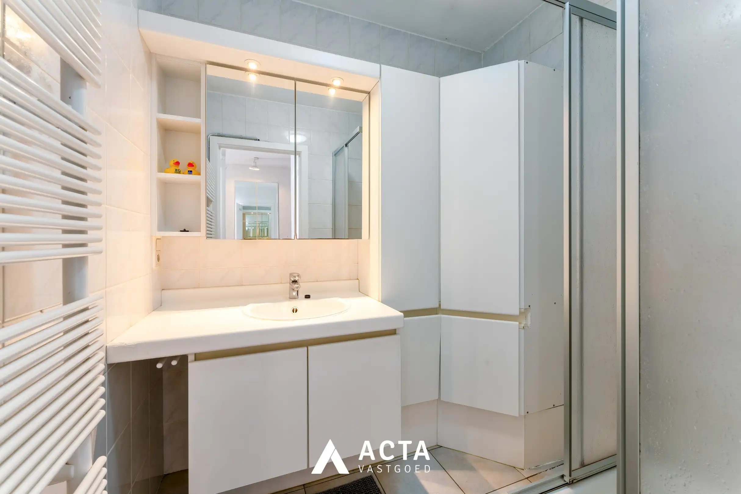 Gelijkvloers 3-slpk-appartement+tuin in Mariakerke foto 12