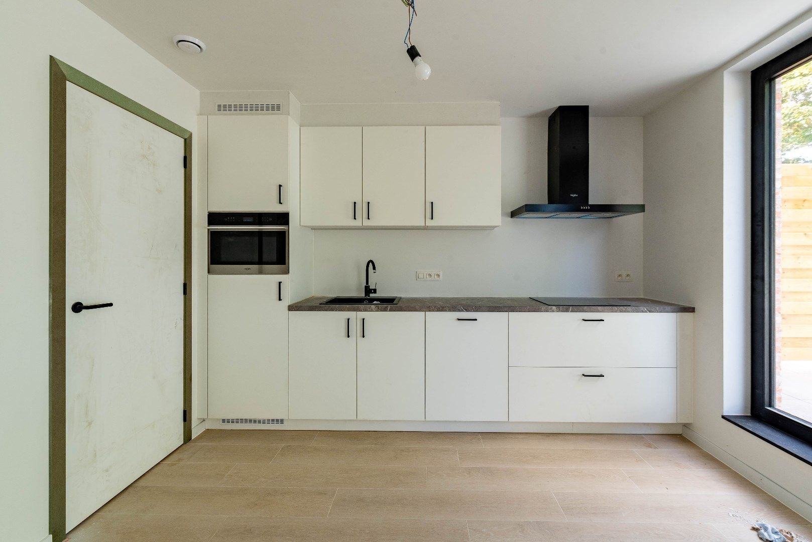 Klassevol nieuwbouwappartement in centrum Halle Zoersel foto {{pictureIndex}}