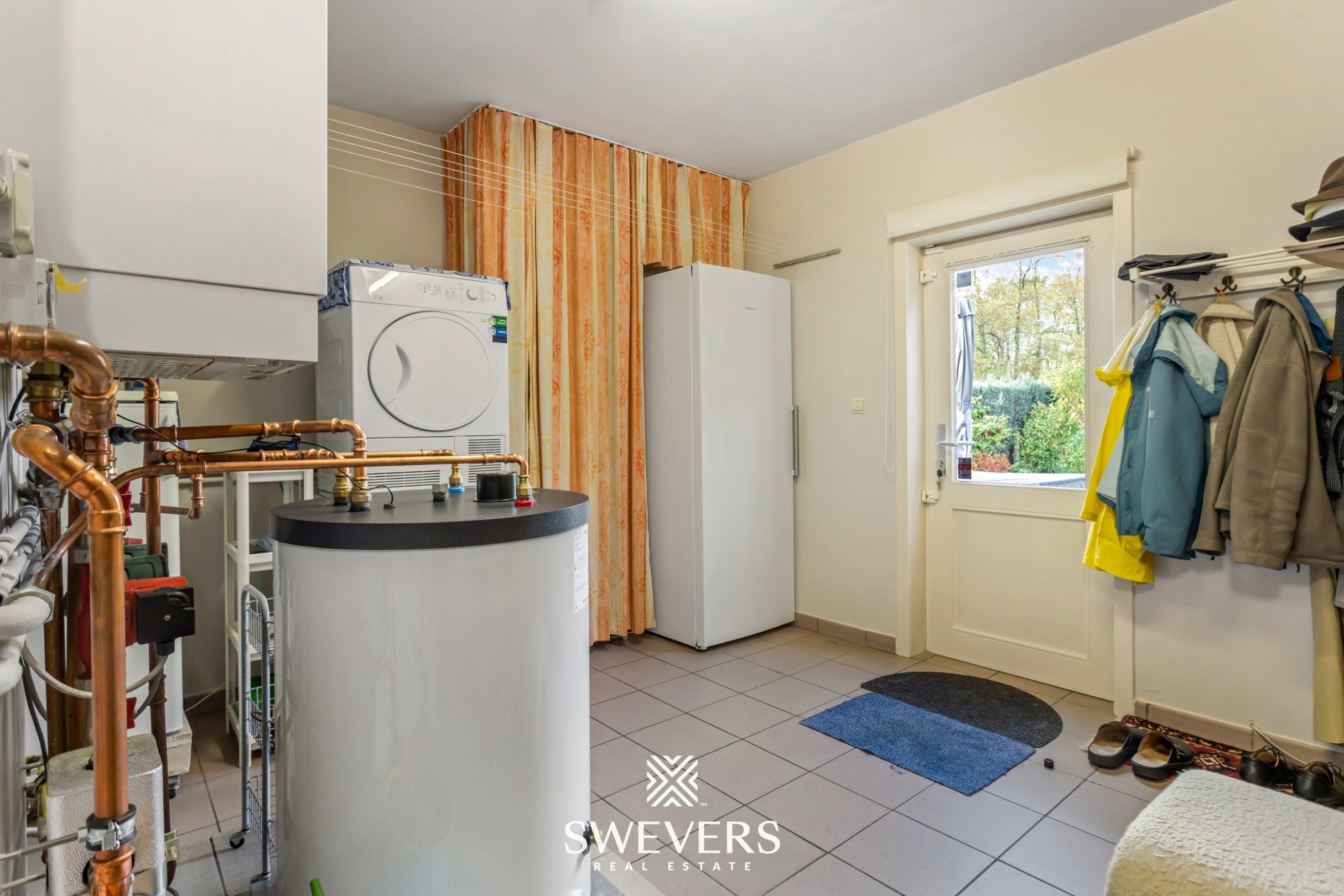 Ruime instapklare gezinswoning met 4 slaapkamers in rustige straat vlakbij Hasselt foto 11