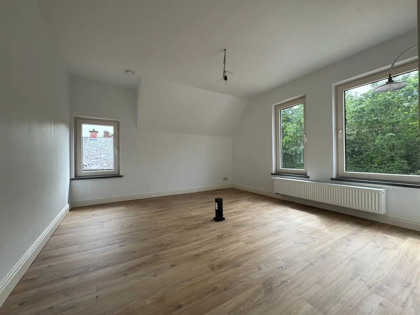 Een 4-gevelwoning met garage en  tuin foto 14