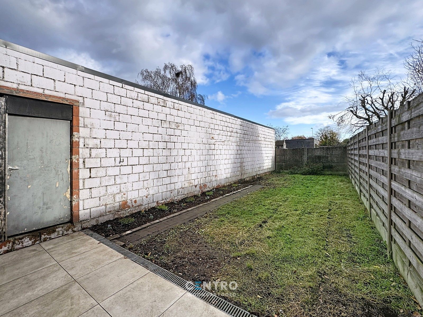 Op te frissen woning met 4 slpks én ZUIDger. tuin te Assebroek! foto 18