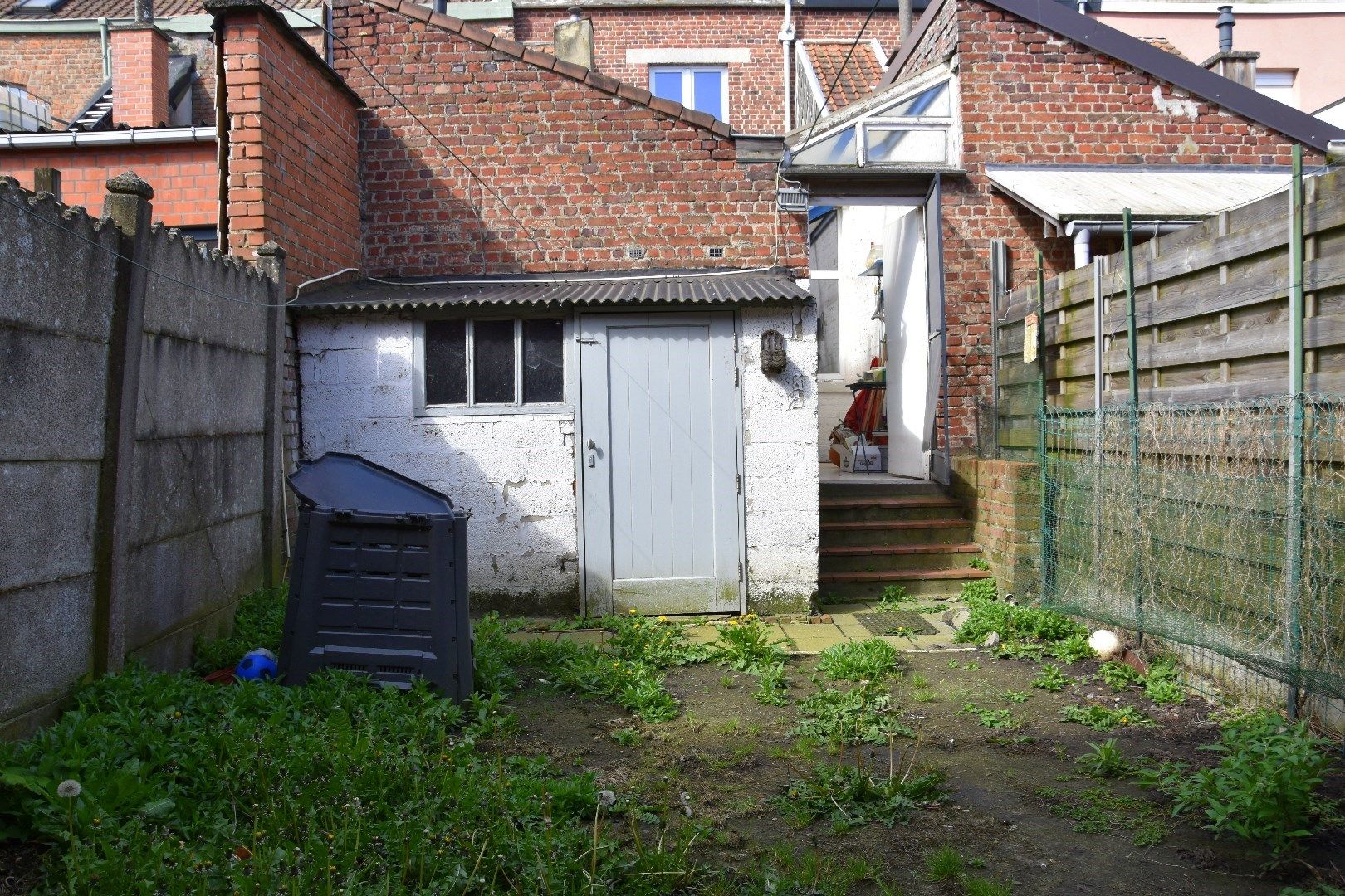 Charmante rijwoning met 3 slaapkamers (mogelijkheid tot meer) en tuin te koop in centrum Menen foto 10