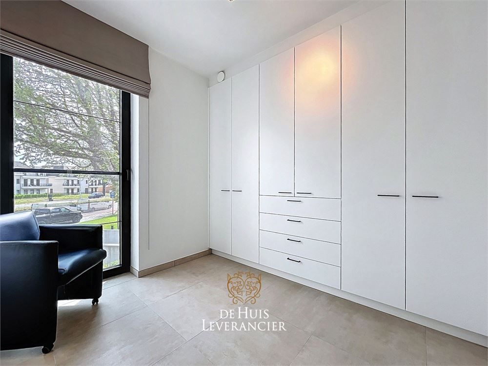 Discrete luxe & tijdloze elegantie : subliem nieuwbouwappartement met terras en gemeenschappelijk tuin te koop in Boechout foto 15