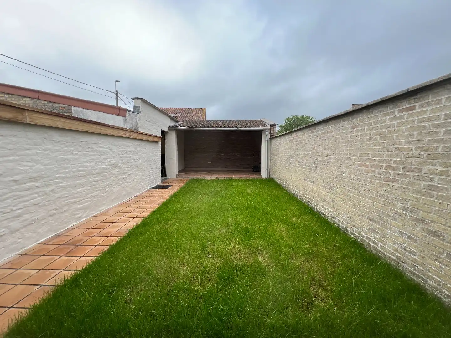 Gezellige woonst met 2 slaapkamers, tuin en garage te Pollinkhove foto 6