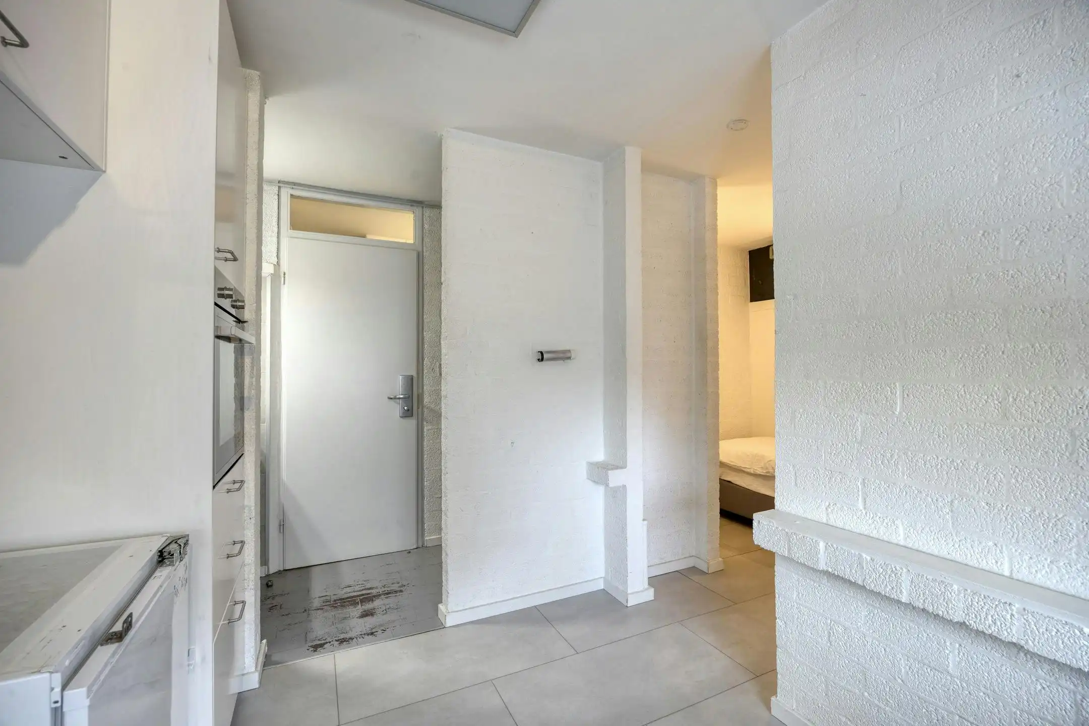 Opbrengsteigendom met 9 studentenkamers en duplex-appartement te Hasselt foto 11