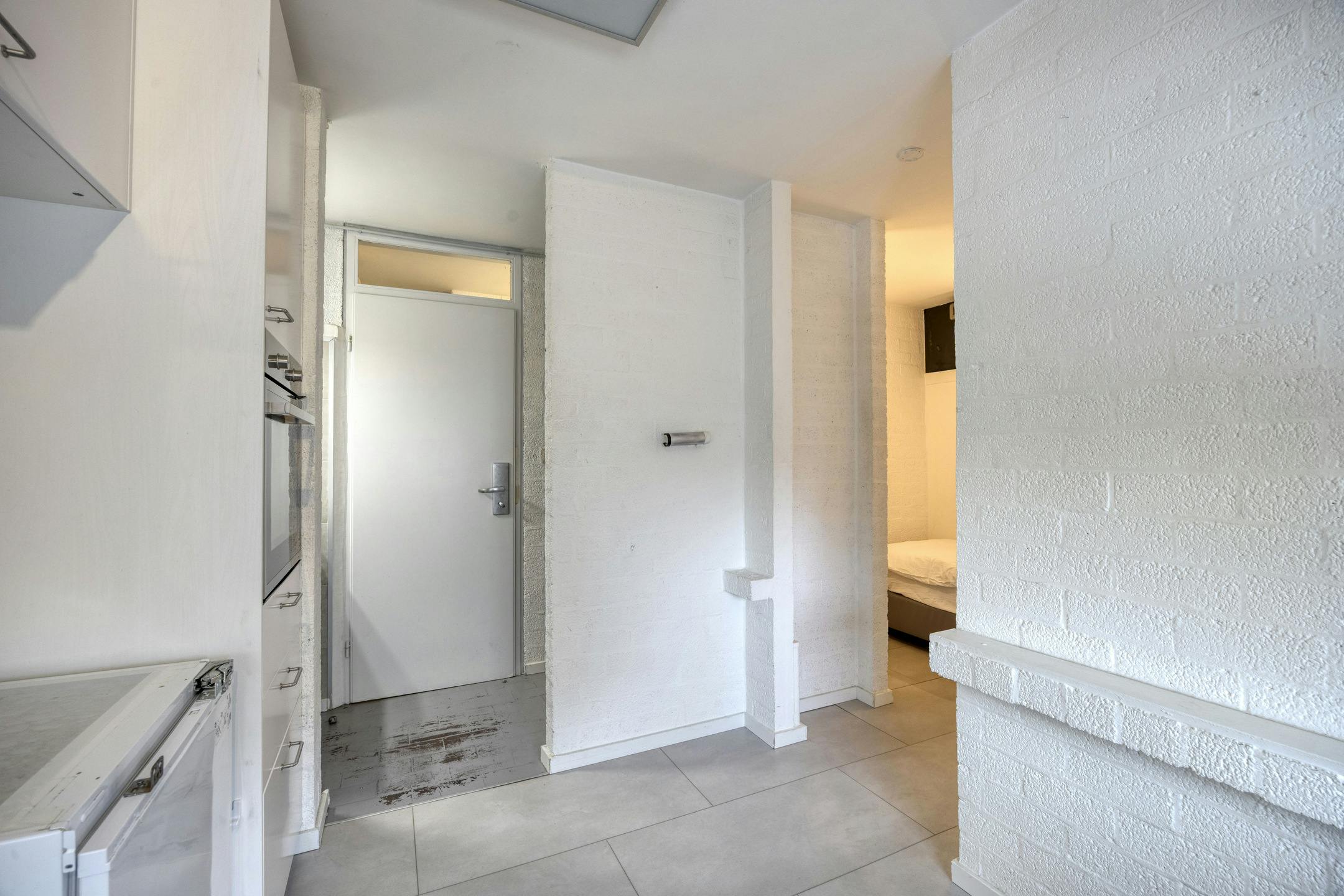 Opbrengsteigendom met 9 studentenkamers en duplex-appartement te Hasselt foto 11