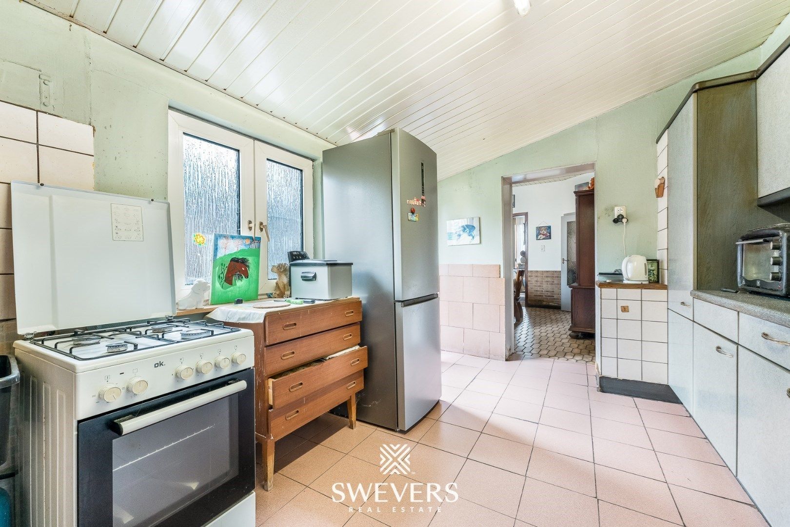 Charmante halfopen woning met renovatiepotentieel in Sint-Truiden foto 13