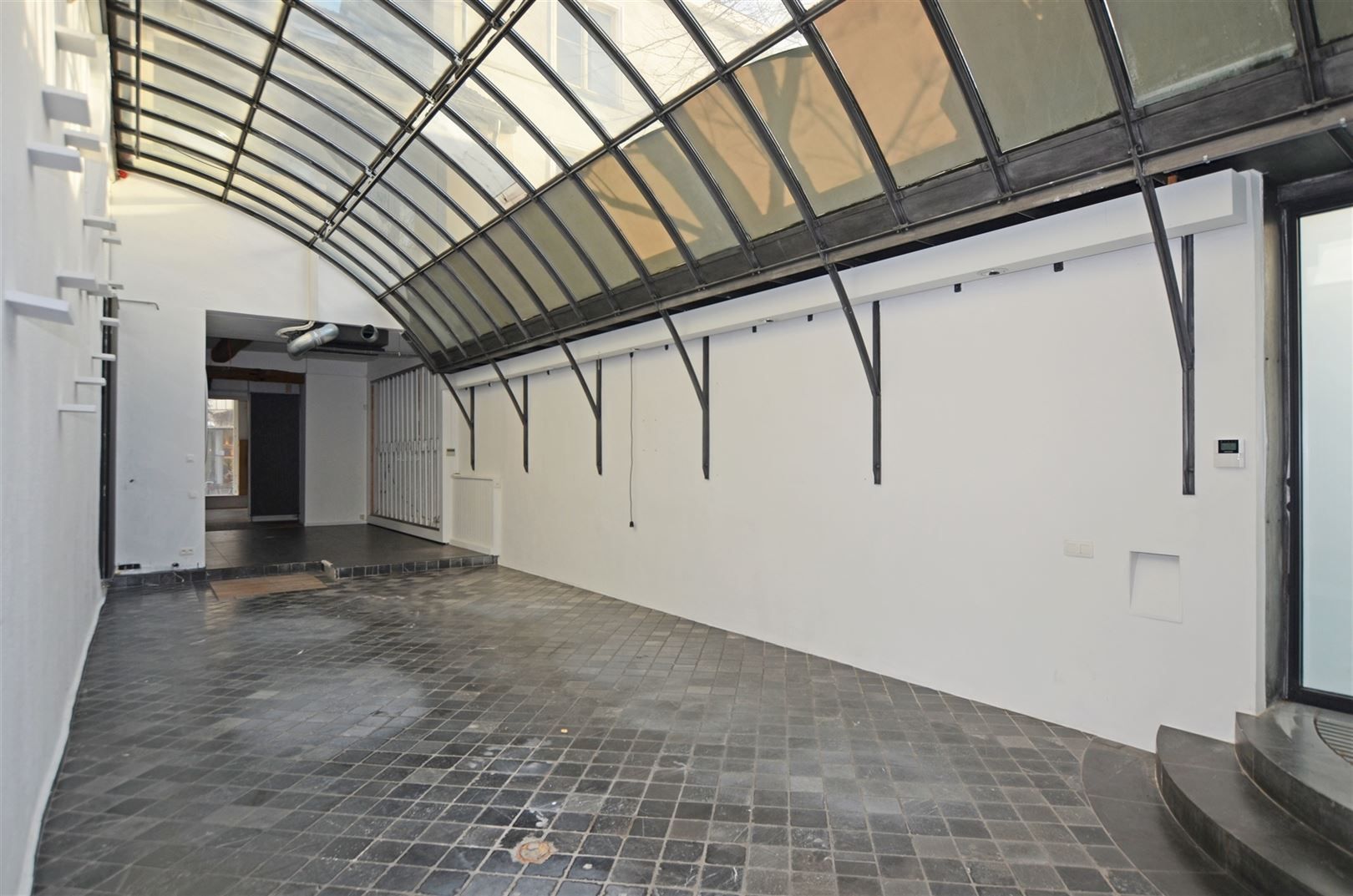 Uniek neoclassicistisch herenhuis met handelspand & duplexwoning foto 4