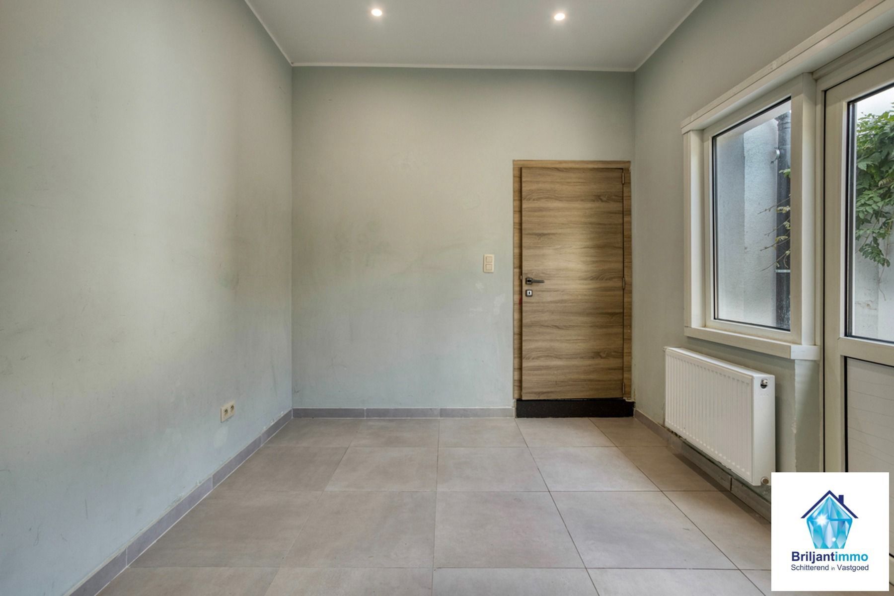 Instapklare woning 2(3) slpkmrs + bureau en garage foto 10