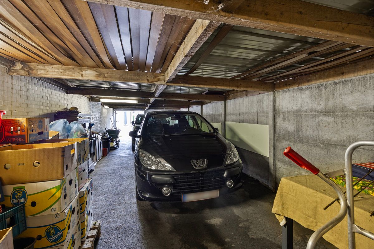 Ruime gelijkvloerse woning met bedrijfshal foto 28
