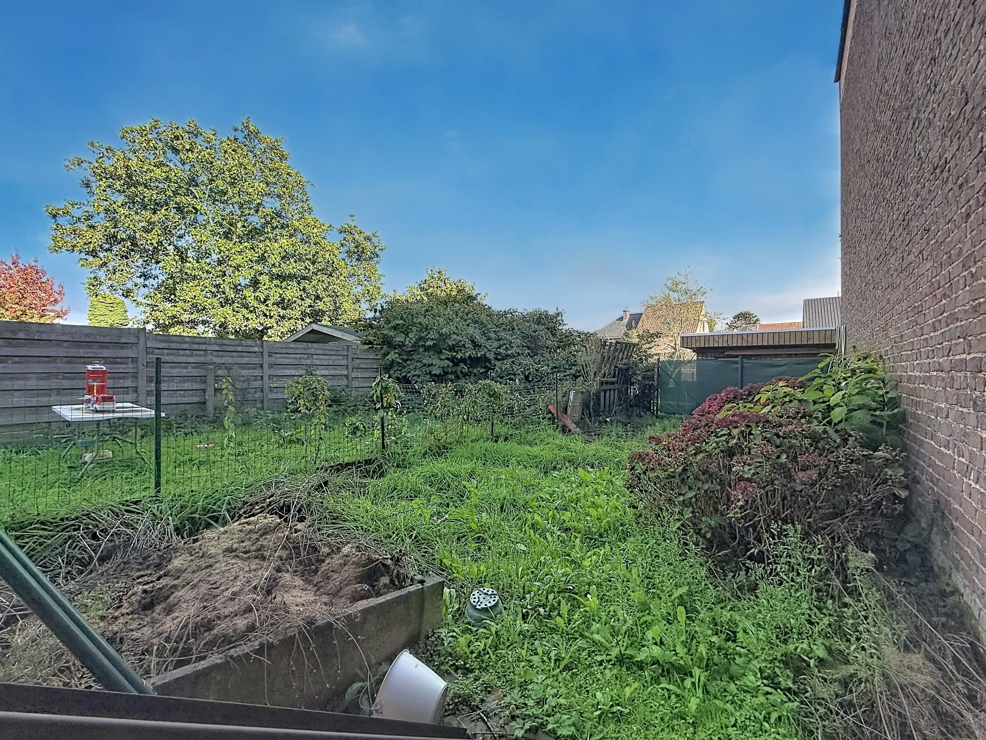 Te koop: Ruime woning met mogelijkheid tot 4 slaapkamers en tuin in Marke! foto 9