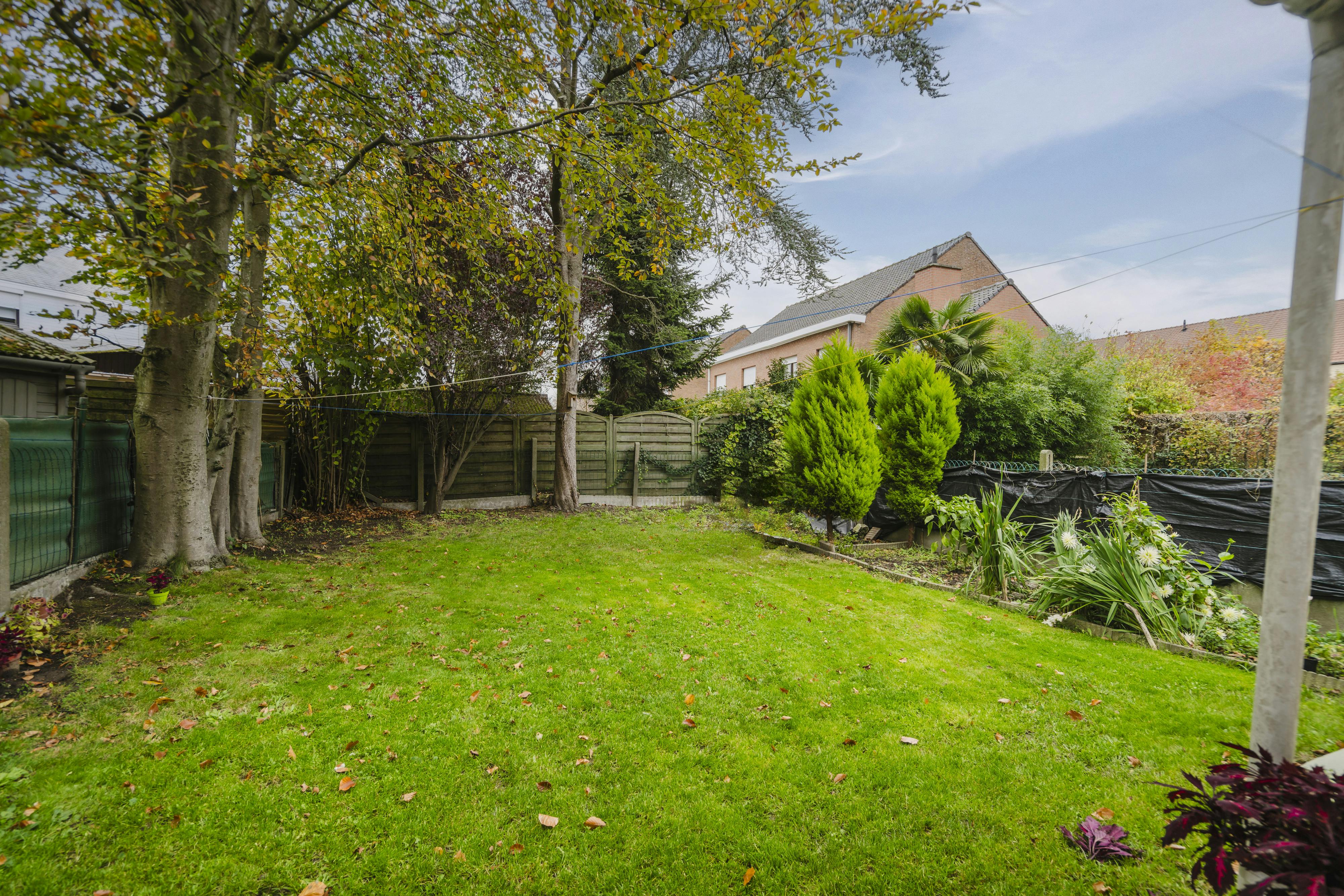 Ruime woning met 4 slaapkamers en tuin in Kortrijk!  foto 7