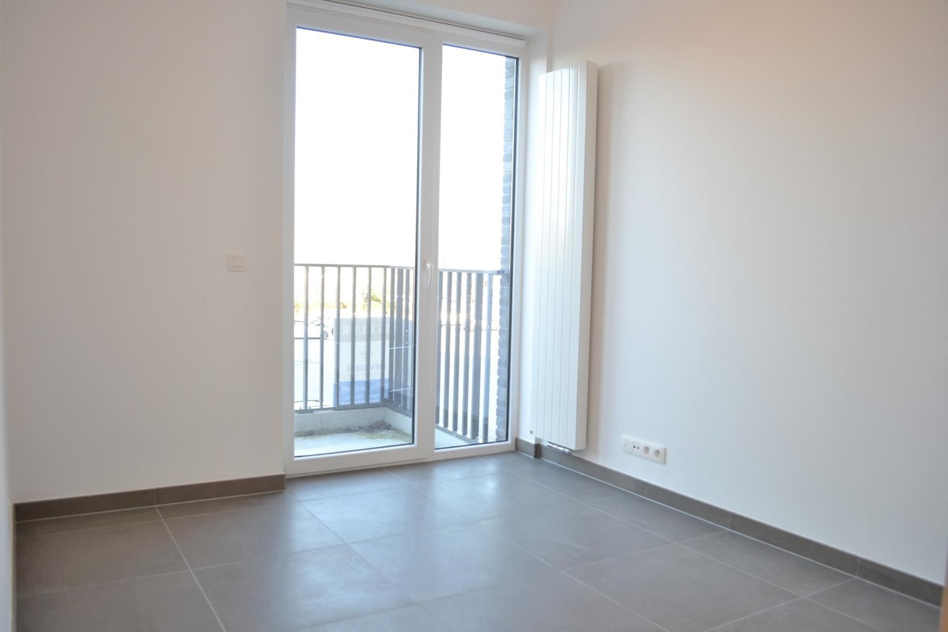 Recent appartement met 2 slaapkamers, 2 terrassen en garagebox te huur in Gullegem foto 9