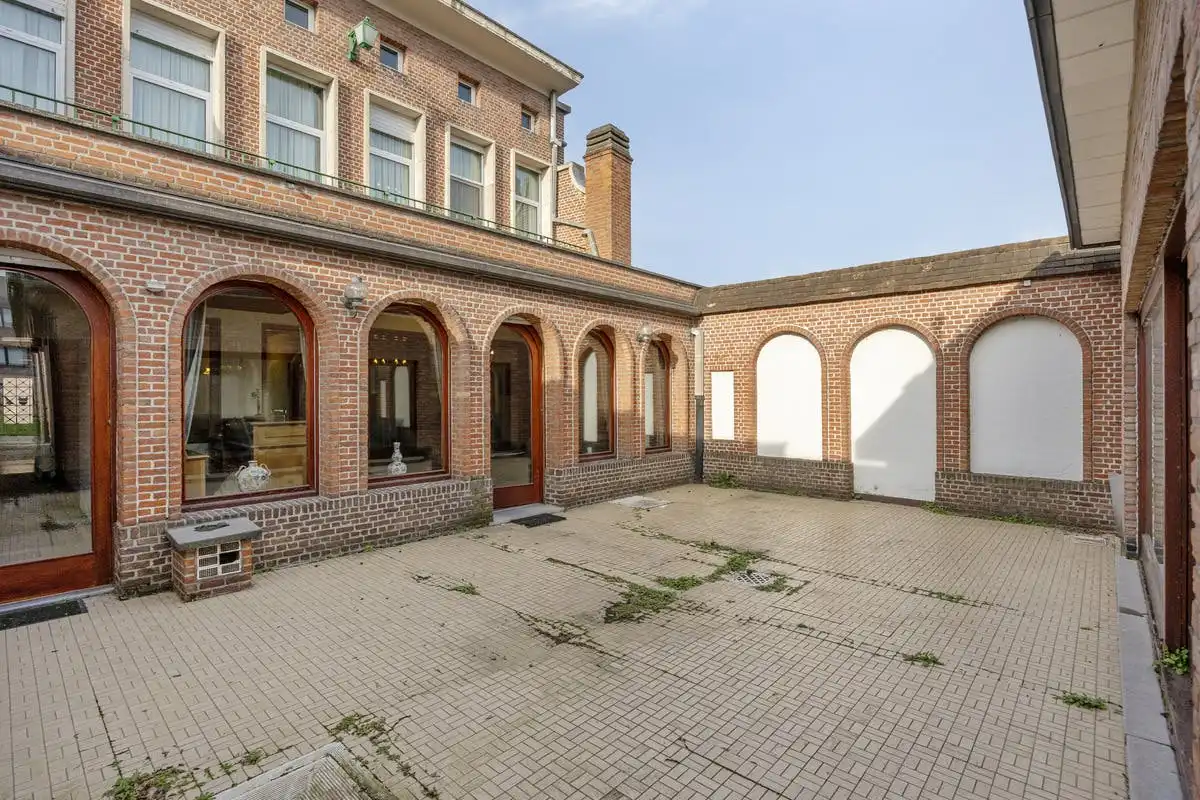 Te renoveren woning te koop in Niel foto 9