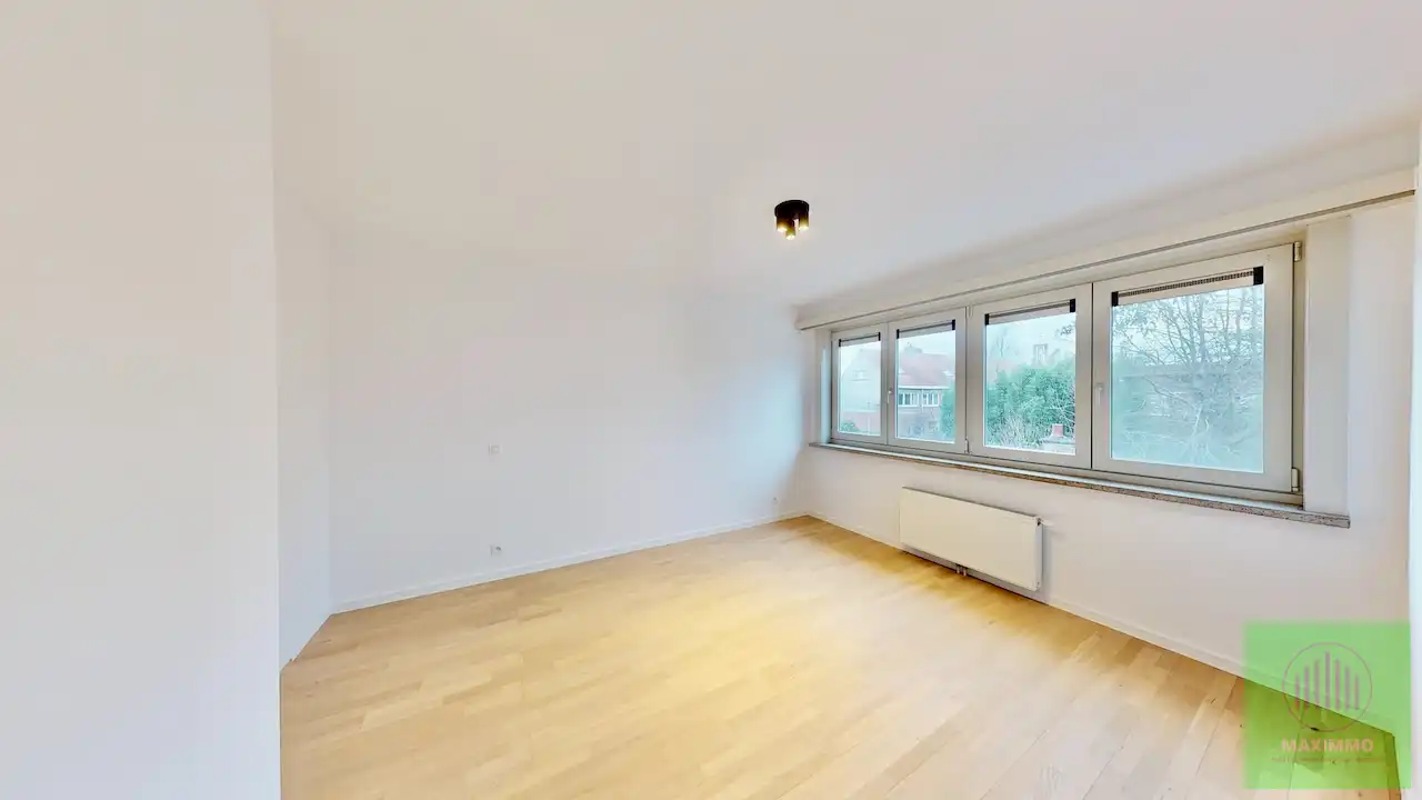 Te koop in Menen: Instapklare, gerenoveerde gezinswoning met tuin foto 5