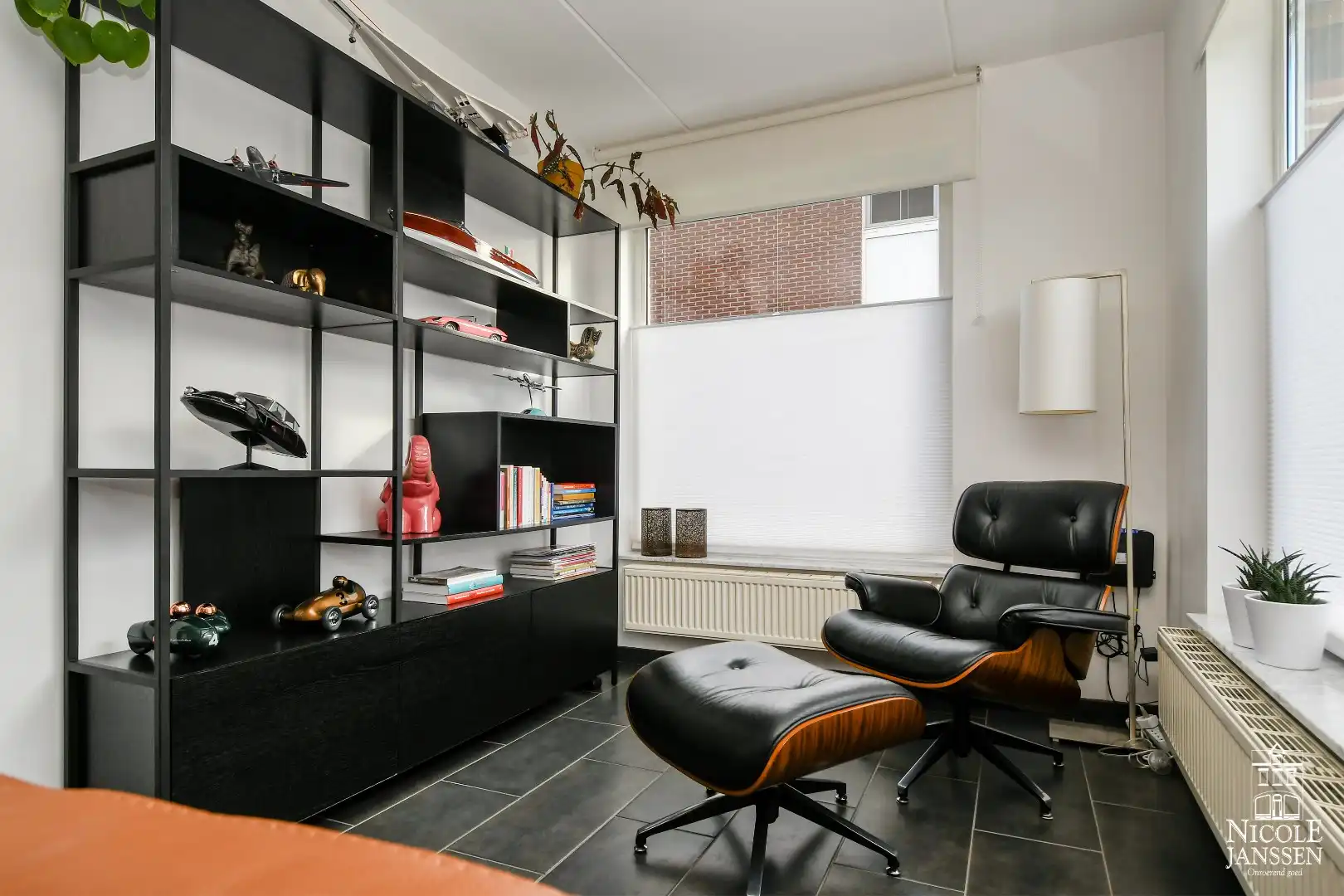 Instapklaar en ruim ingedeeld woonhuis met tuin foto 6