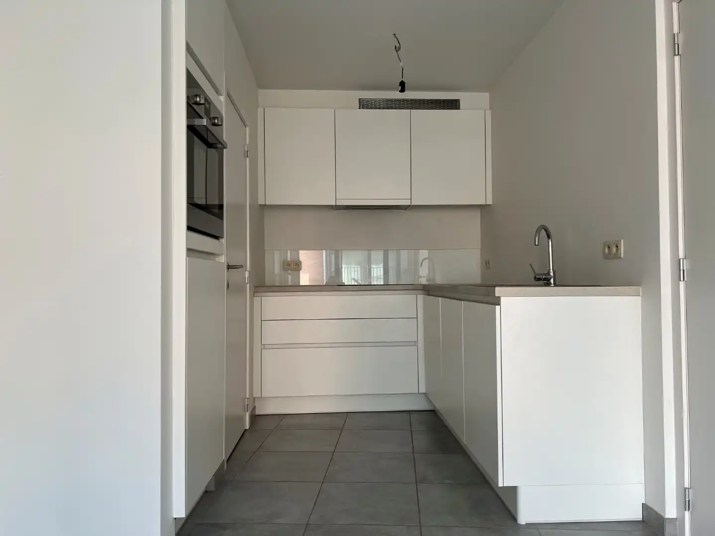 Appartement te Diest : slaapkamer en terras foto 7