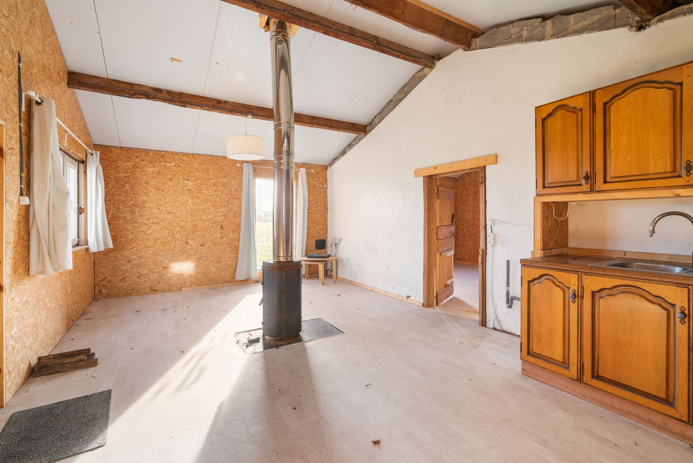 Te renoveren woning met zicht op de velden te Knesselare foto 8