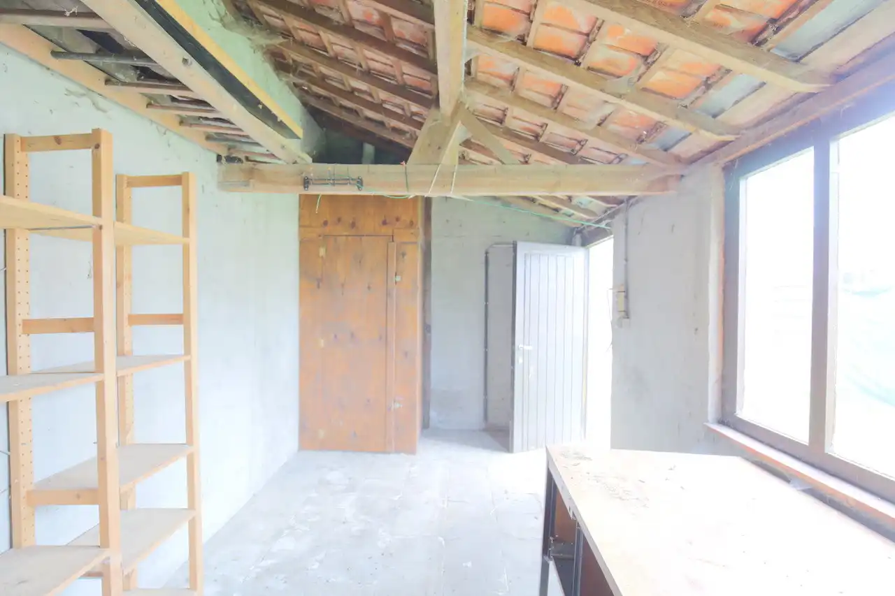 Rijwoning met terras en tuin foto 12