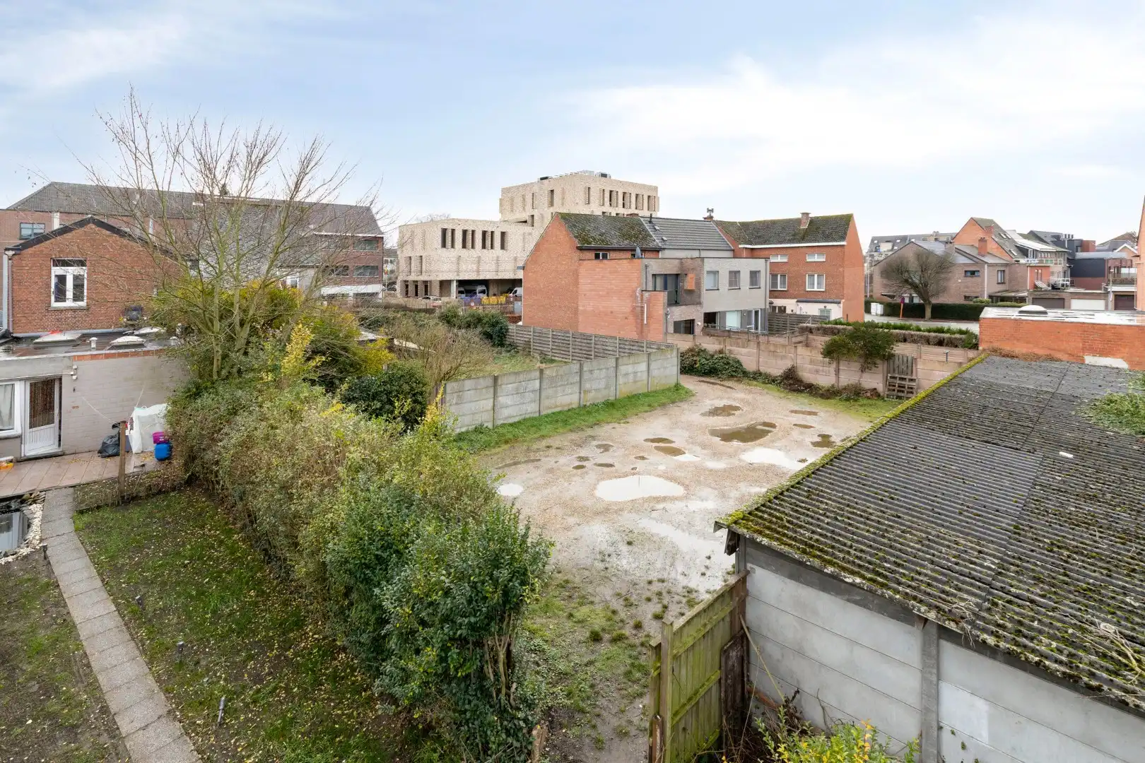 Projectgrond bestaande uit 2 bouwgronden voor GB + 8 staanplaatsen (+ mogelijk om rechtse woning te kopen) foto 6