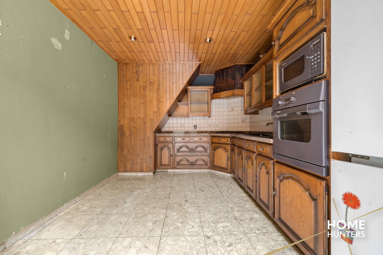 Te renoveren woning met 3 slaakamers en een zonnige tuin foto 9