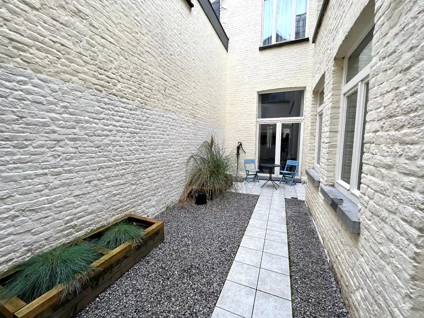 Studentenkamers of co-housing te huur pal aan de grote markt te Kortrijk foto 18