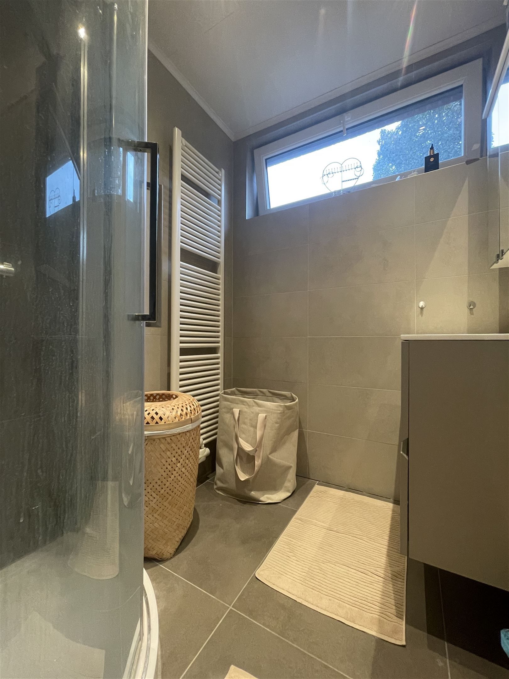 Totaal gerenoveerd GV appartement met tuin te Grembergen foto 7