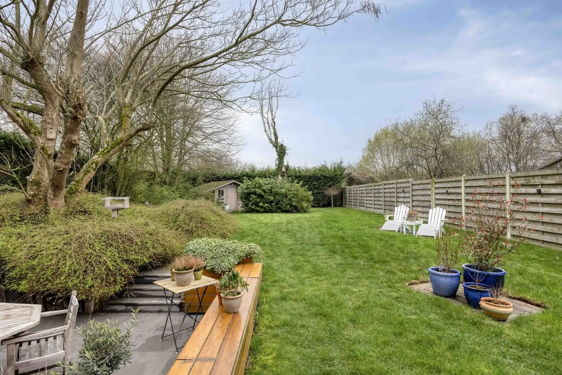 Open bebouwing met 4 slaapkamers, garage en tuin.  foto 19