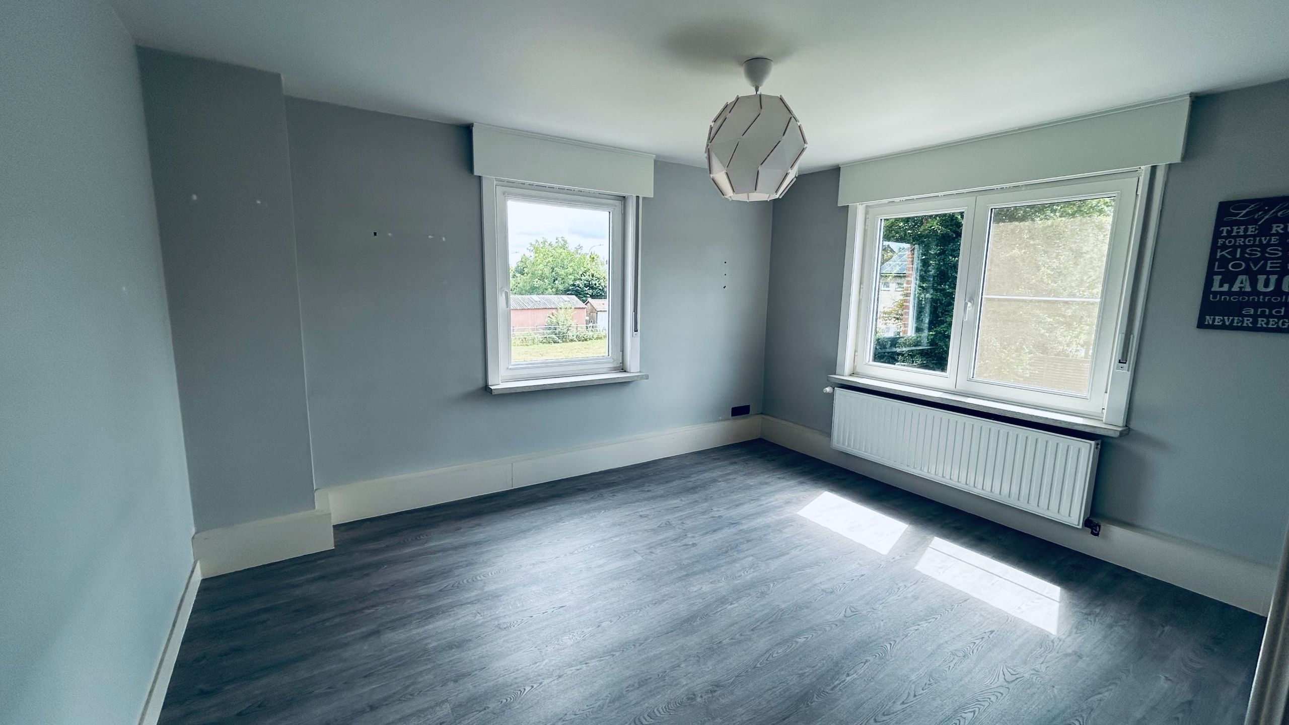 Centraal gelegen halfopen bebouwing met: oprit, tuin en garage foto 7