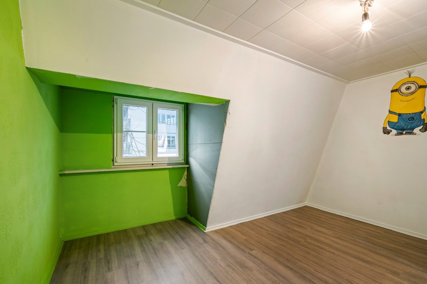 Rijwoning met 2 slaapkamers, zonnige tuin en inpandige garage in Stasegem  foto 9