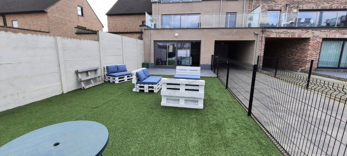 Gelijkvloers app met 1 slk, terras en tuintje, autostaanplaats én garage foto 7