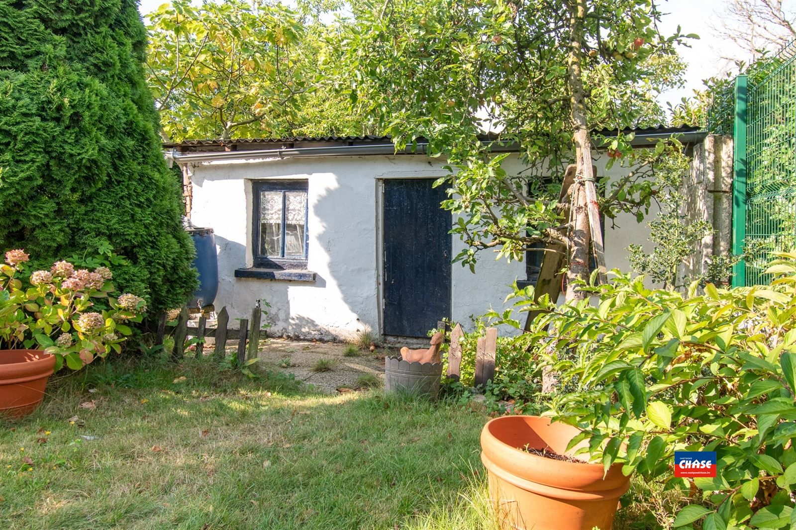 Rijwoning met 3 slaapkamers en gezellige tuin foto 12