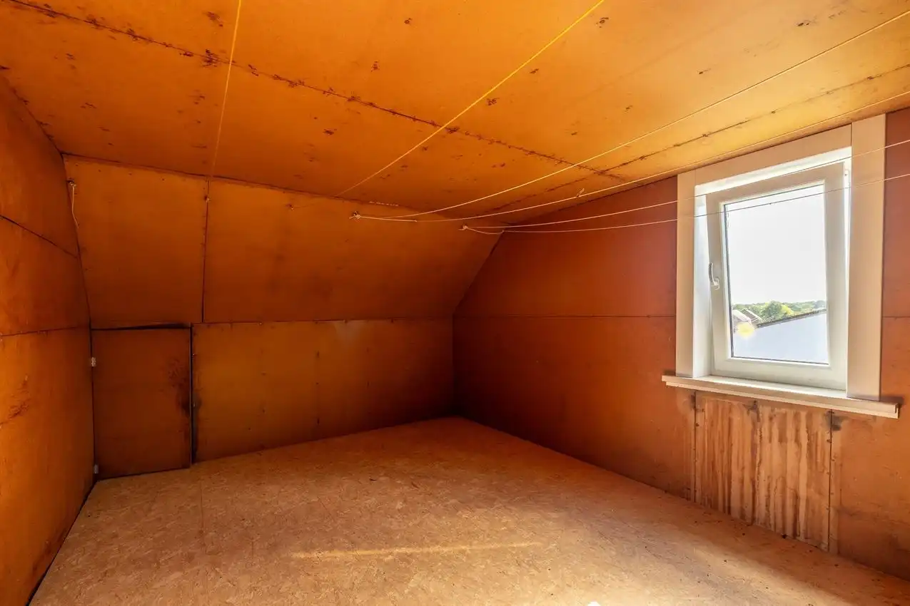 Karaktervolle woning met grote tuin, bijgebouwen en uitbreidbaar zoldervolume op een verrassend diep perceel foto 31