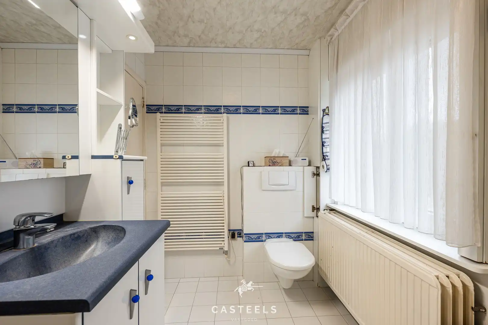 Ruime gezinswoning met zonnige tuin te koop in Lokeren foto 21