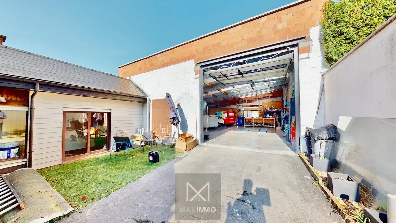 Gelijkvloerse bungalow met loods van 180 m² in het centrum van Marke foto 5