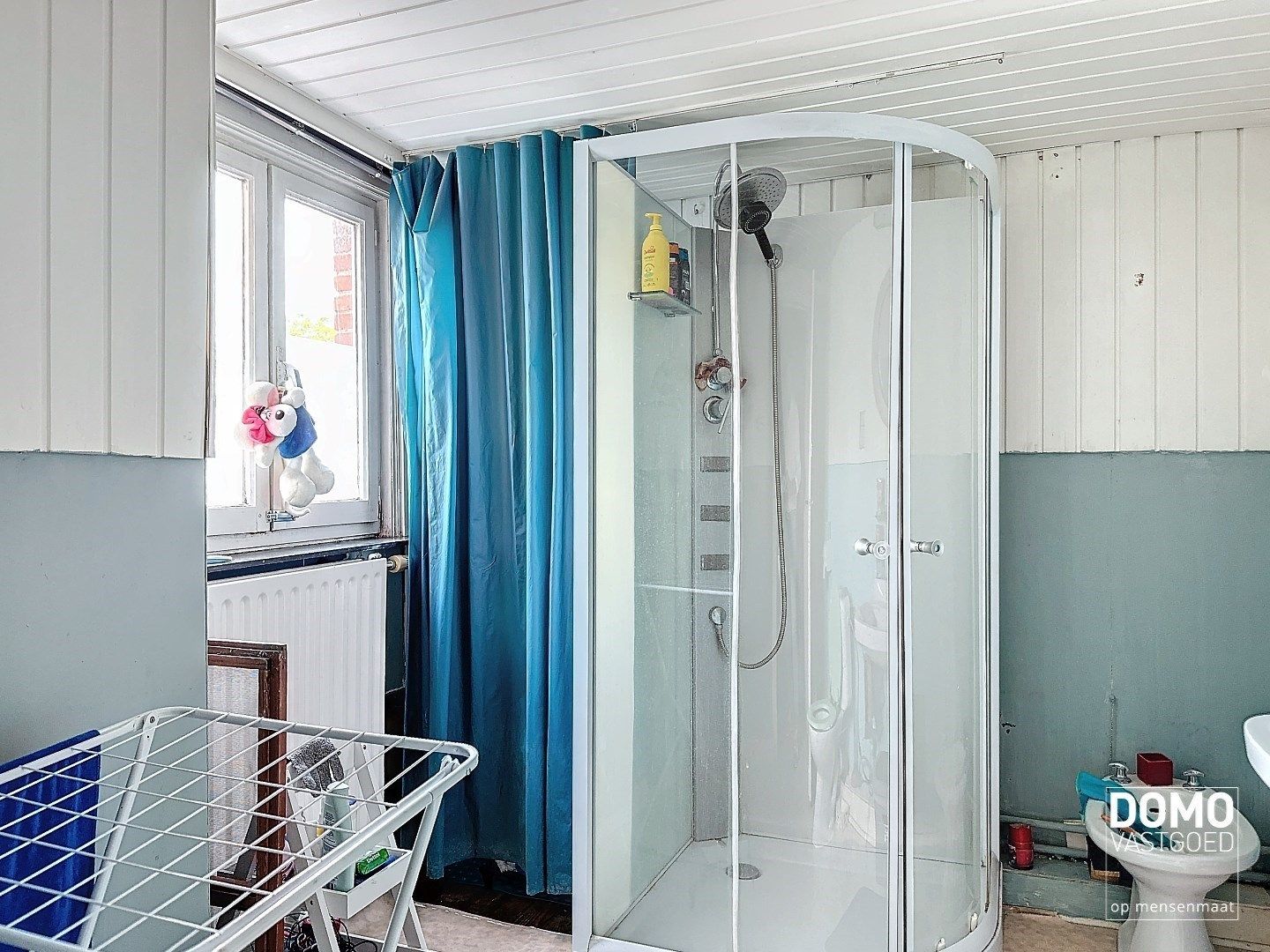 Te renoveren rijwoning met tuin en 3 slaapkamers in Hasselt. foto 9