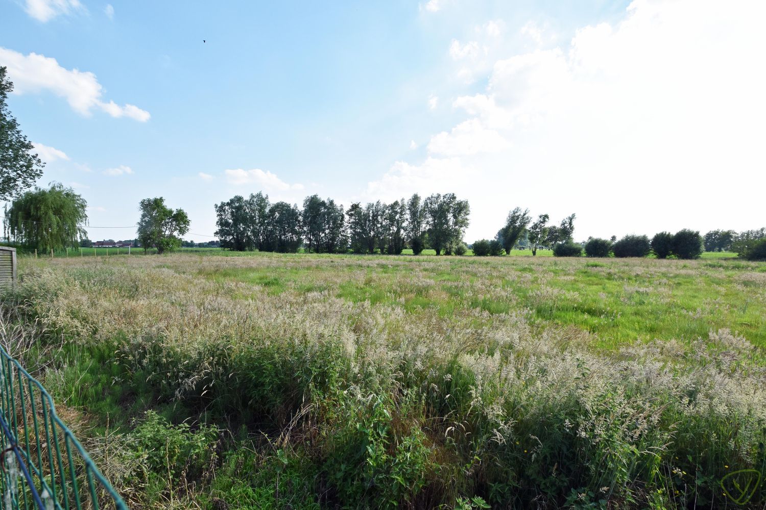 Makkelijk toegankelijk stuk landbouwgrond nabij het centrum van Knesselare foto 3