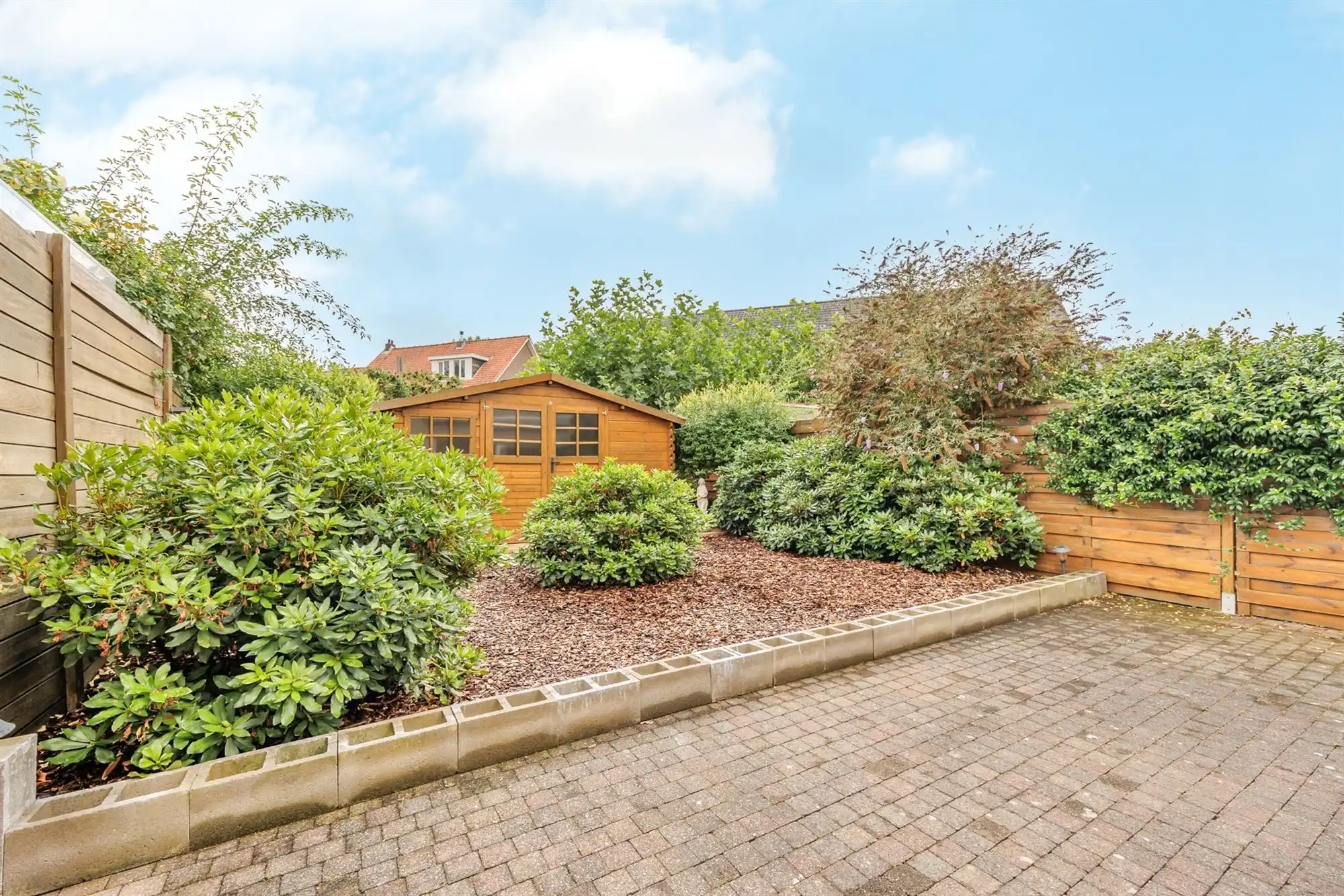 Instapklare ruime woning met 4 slpkmrs. en tuin foto 22