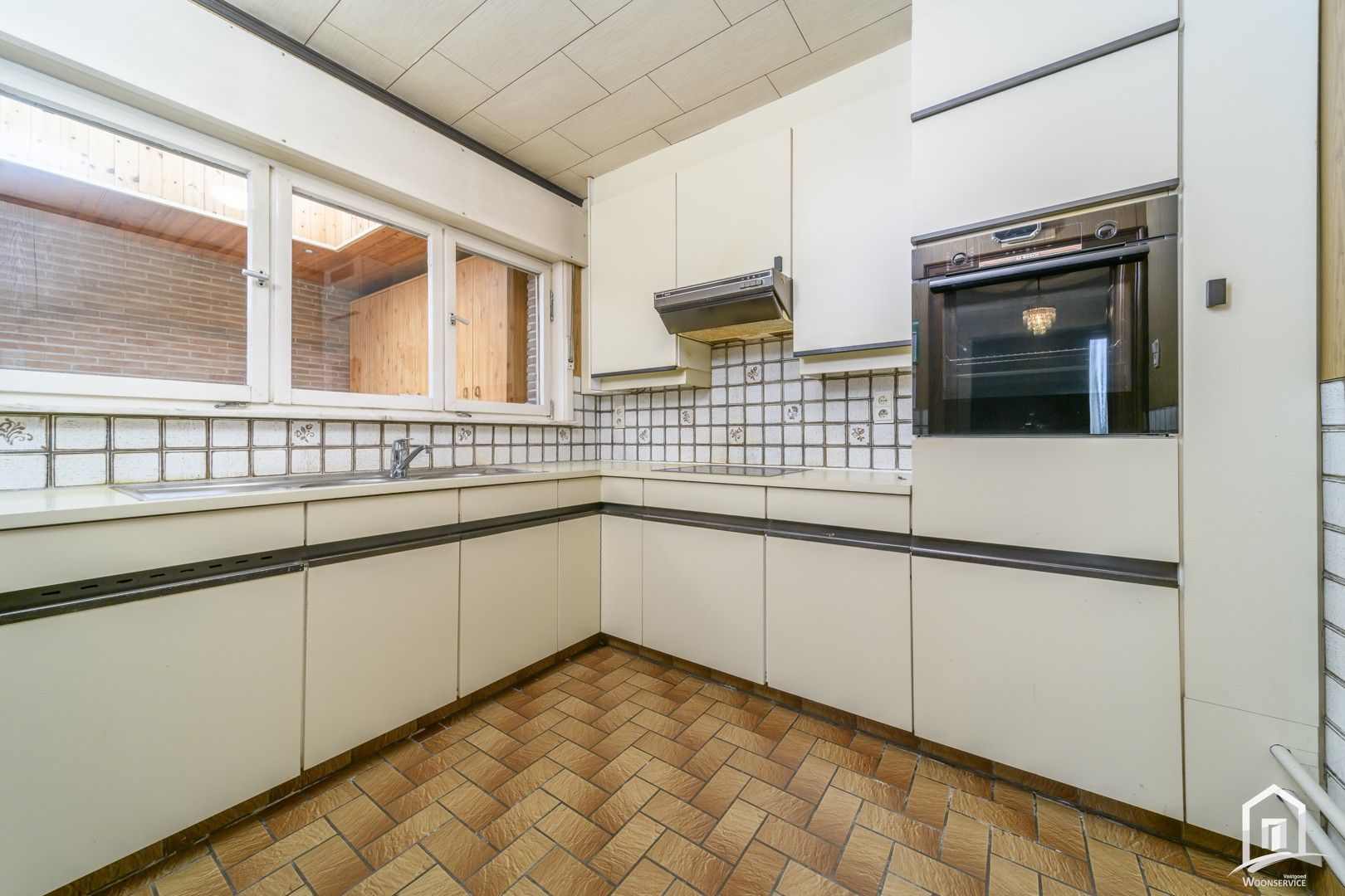 Gunstig gelegen gezinswoning met tuin en garage. foto 10