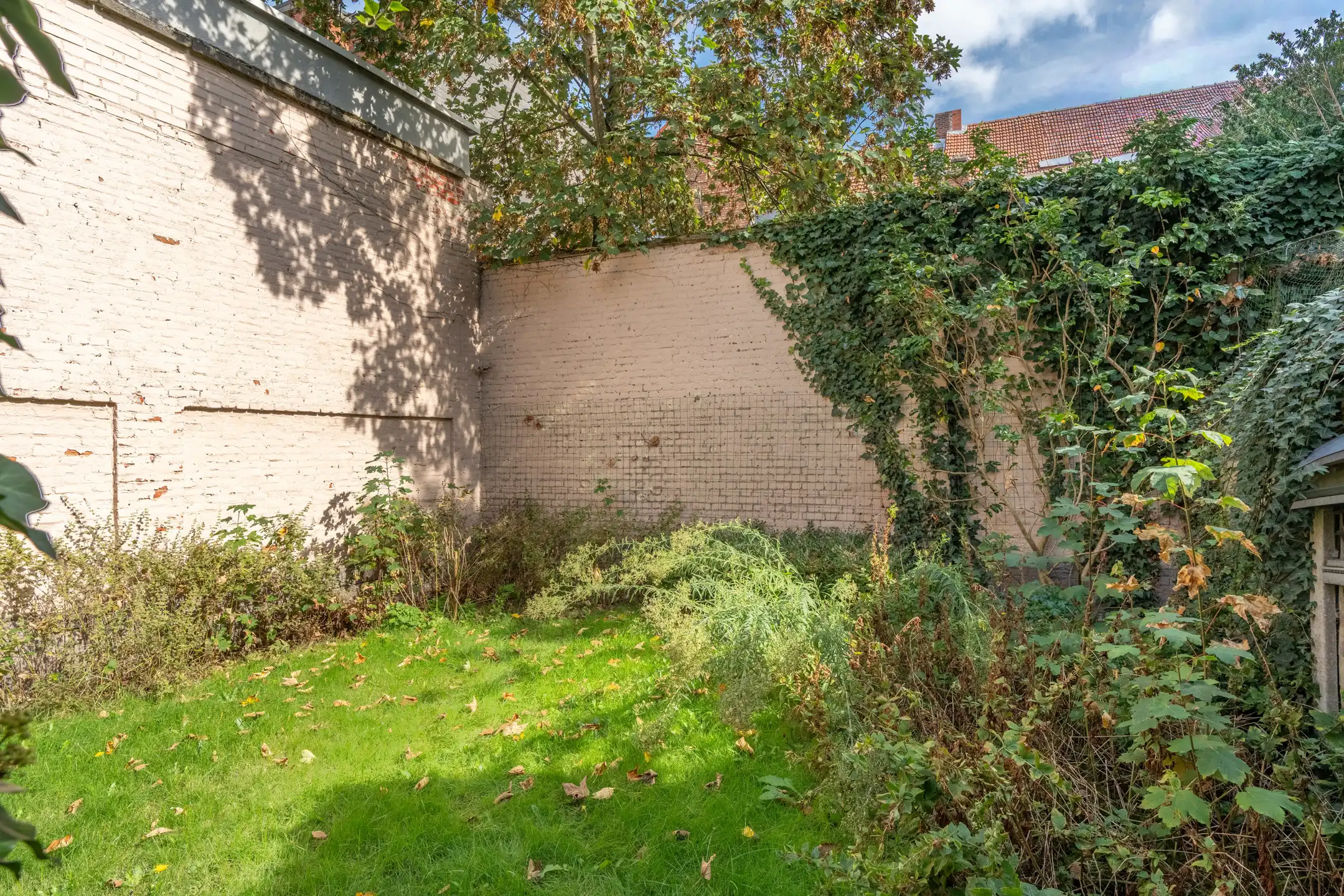 Charmante stadswoning met 2 wooneenheden, garage en tuin foto 3