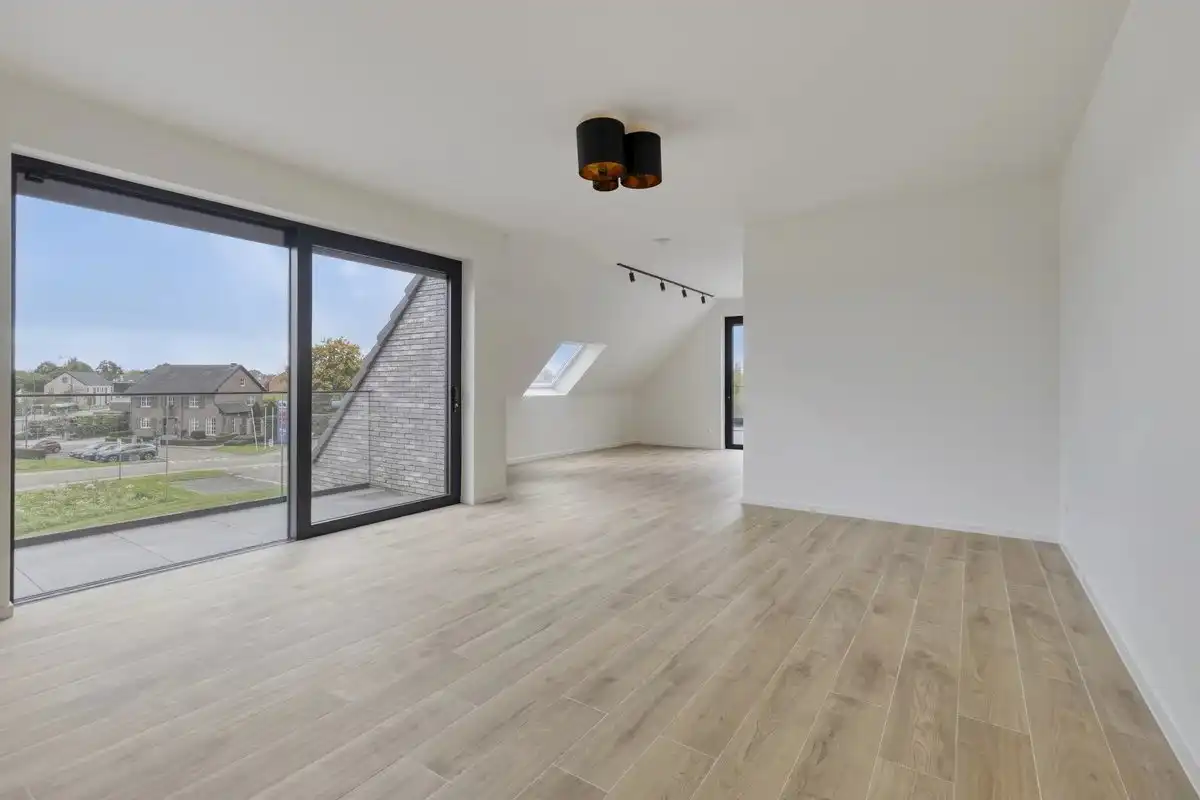 EXCLUSIEF EN KWALITATIEF NIEUWBOUWAPPARTEMENT VAN 163 M² MET 3 SLPK'S, 2 BADK'S EN RIANTE TERRASSEN IN MUNSTERBILZEN foto 2