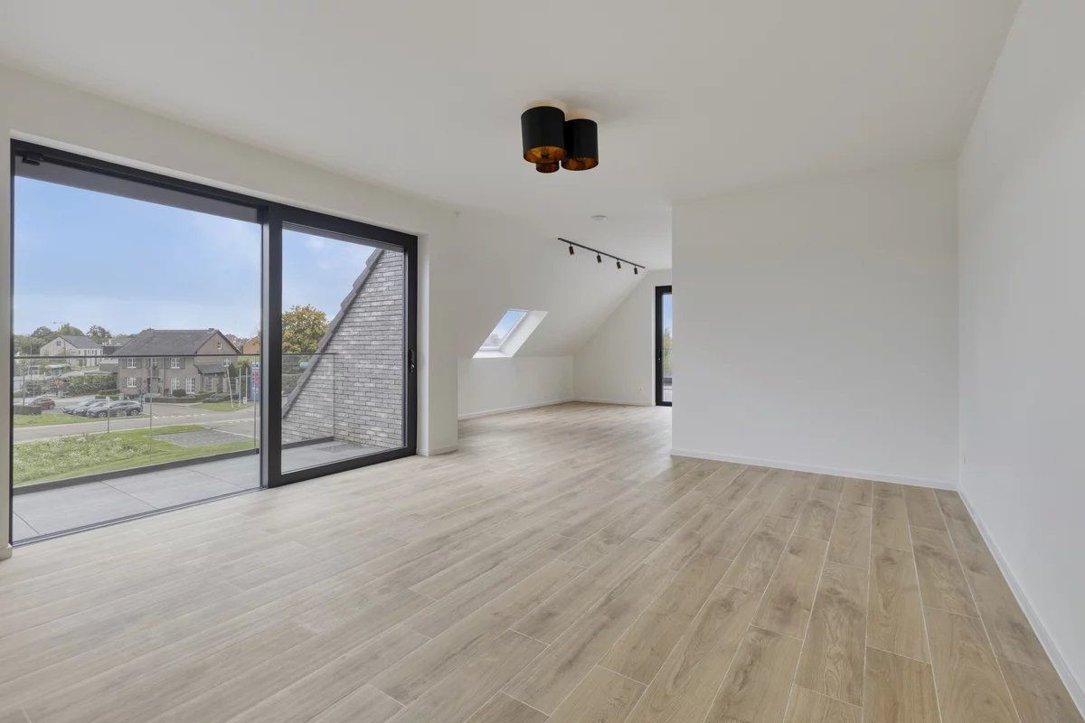 EXCLUSIEF EN KWALITATIEF NIEUWBOUWAPPARTEMENT VAN 163 M² MET 3 SLPK'S, 2 BADK'S EN RIANTE TERRASSEN IN MUNSTERBILZEN foto 2