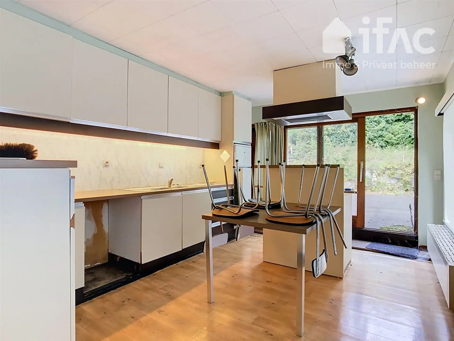 Te renoveren woning met ex-praktijk in centrum Overijse foto 14