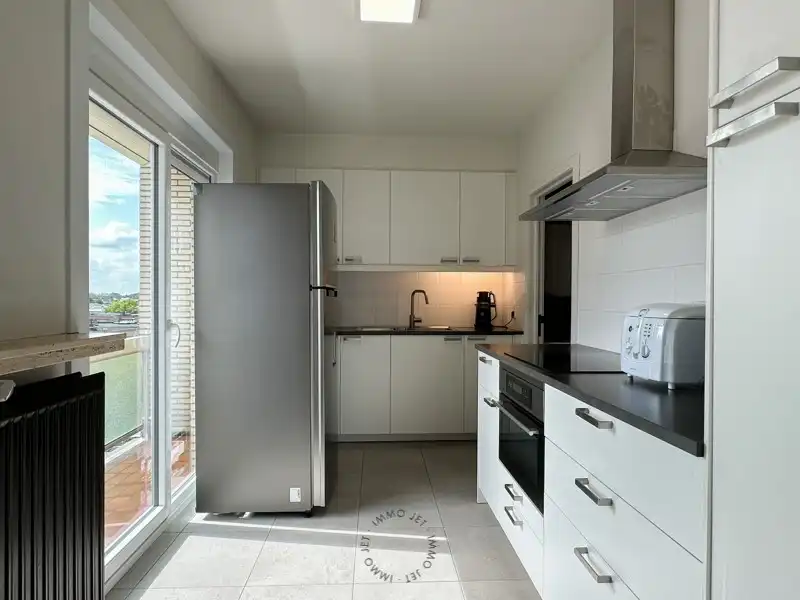 Lichtrijk appartement met twee slaapkamers, terras en optionele garagebox in Sint-Niklaas foto 9