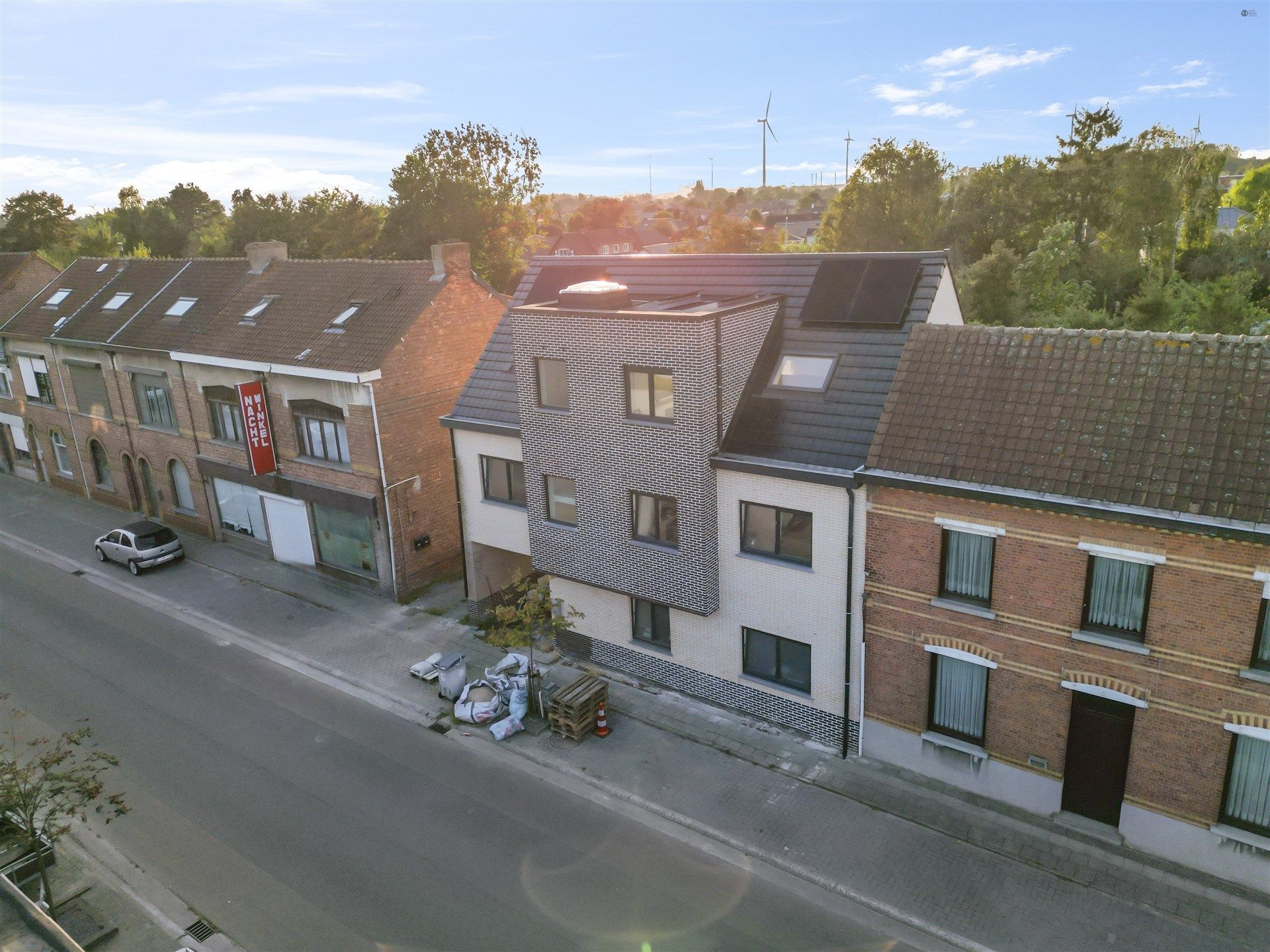 Nieuwbouw appartementsblok van 3 appartementen en 4 garageboxen foto 6