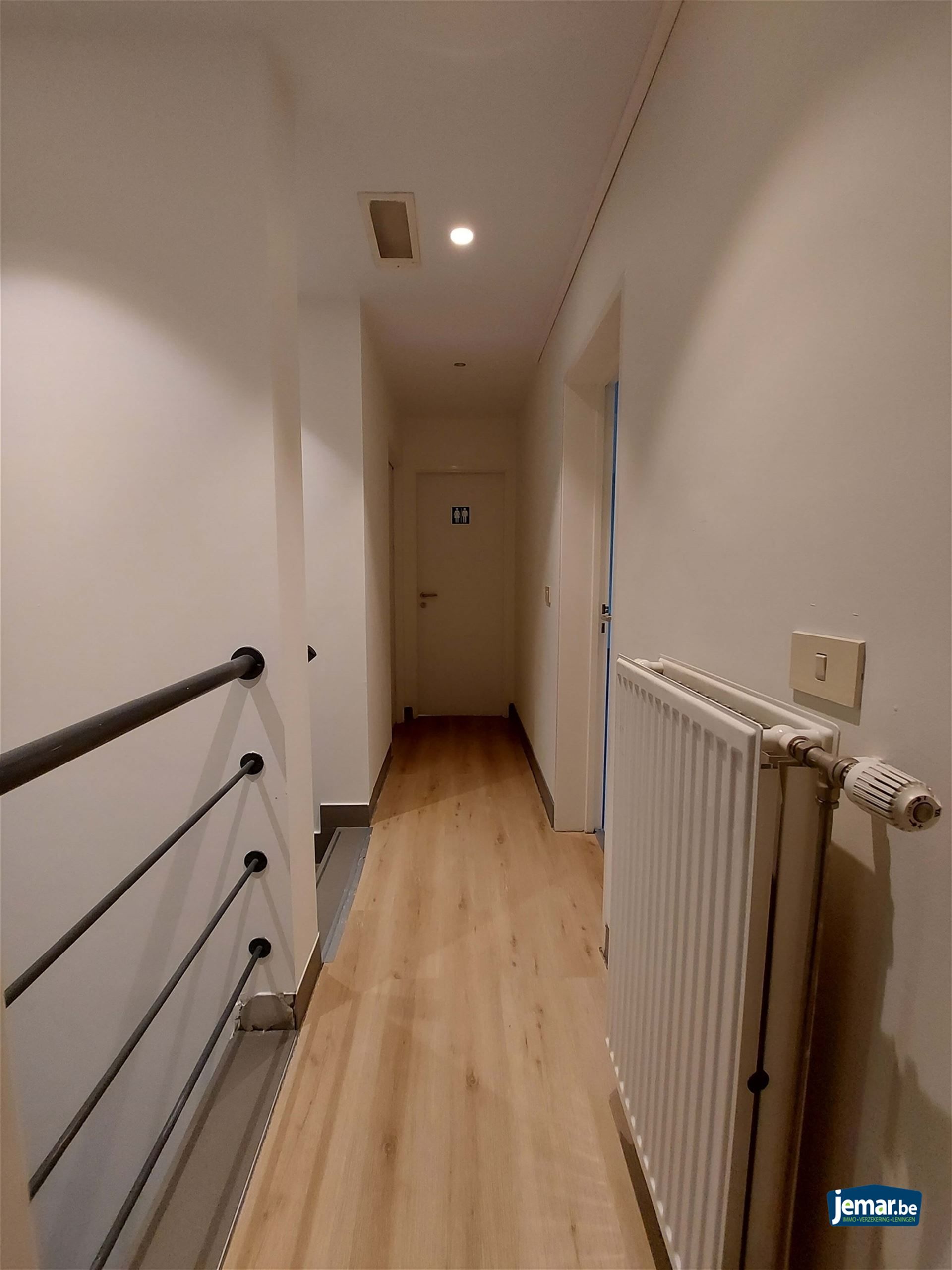 AANDELENOVERDRACHT: Handelspand met appartement foto 17