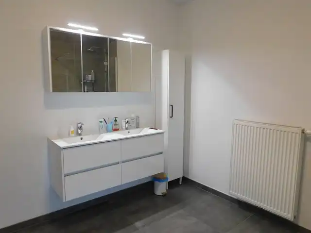 Rustig gelegen, energiezuinig appartement met carport foto 11
