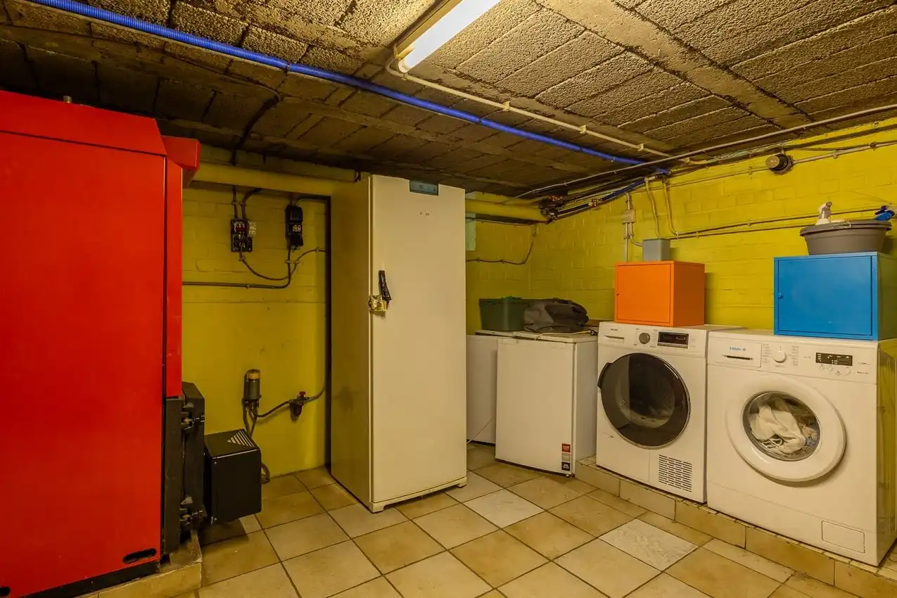 Ruime retrowoning met EPC C,  zuidtuin en achterliggende toegang. foto 45